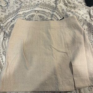 Never been worn beige lioness skirt